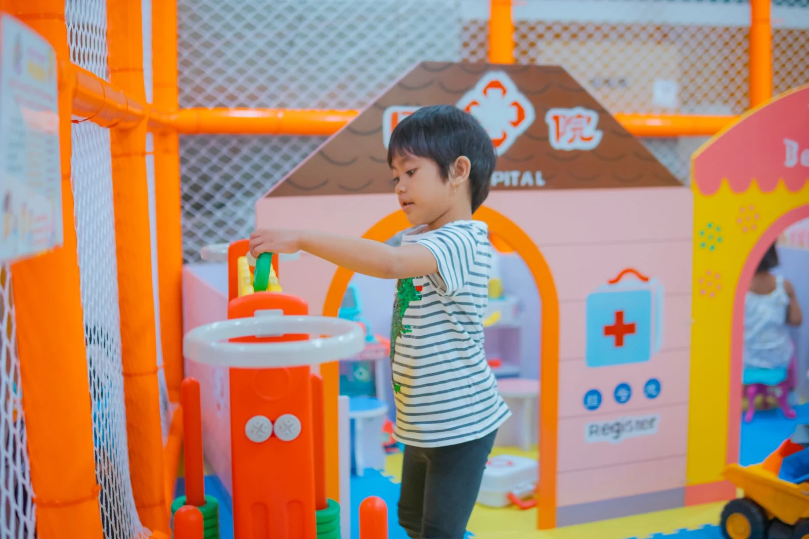 Children playing at an indoor playground