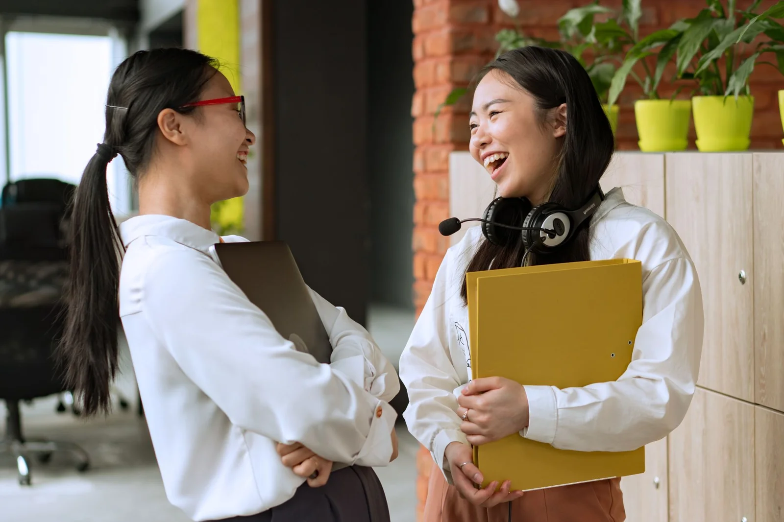 Coworkers laughing together after an event